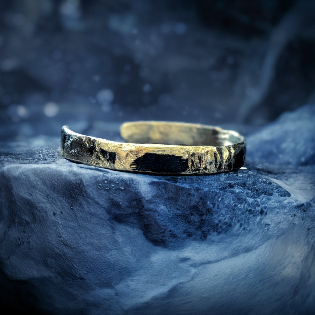 Bracelet laiton patine noire.